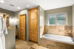 Large soaking tub and separate shower